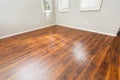 Newly Installed Brown Laminate Flooring and Baseboards in Home Royalty Free Stock Photo