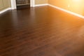 Newly Installed Brown Laminate Flooring and Baseboards in Home Royalty Free Stock Photo