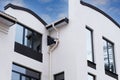 Newly installed construction of rain gutter system on the roof of frame house Royalty Free Stock Photo