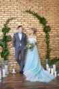 Newly married couple, loving couple before the wedding. Man and woman loving each other. Bride in the turquoise dress and groom Royalty Free Stock Photo