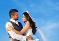 Newly married couple portrait with blue sky Royalty Free Stock Photo