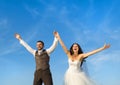 Newly married couple portrait with blue sky Royalty Free Stock Photo