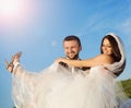 Newly married couple portrait with blue sky Royalty Free Stock Photo