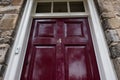 Newly painted front door located at the entrance to a large private house. Royalty Free Stock Photo