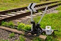 Newly painted hand-operated railroad switch with point indicator