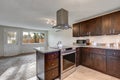 Newly renovated kitchen with dark wood cabinetry