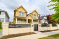 Newly renovated luxury residential house for sale. Big family house for with concrete pathway and metal fence