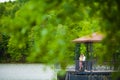 Newly wed couple embracing next to a lake Royalty Free Stock Photo