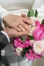 Newly wed couple& x27;s hands with wedding rings Royalty Free Stock Photo
