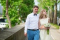 Newly-wed couple walking in Paris Royalty Free Stock Photo