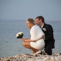 Newly wedded on seashore