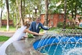 Newly wedding couple in a park