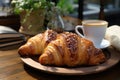 Newly worked croissant and coffee at breakfast ge Royalty Free Stock Photo