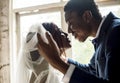 Newlywed African Descent Groom Open Bride Veil Wedding Celebration