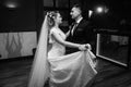 Newlywed couple first dance at ballroom, bride and groom dancing Royalty Free Stock Photo