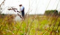 Newlywed couple happy together at field, in the foreground ears Royalty Free Stock Photo