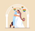 newlywed lesbian couple with flowers kissing near wedding arch transgender love LGBT community wedding celebration