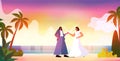 newlywed lesbian couple walking on beach transgender love LGBT community wedding celebration concept