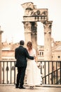 Newlyweds in the ancient city. Happy married couple. Rome, Italy. Royalty Free Stock Photo