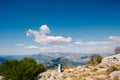 Newlyweds on the background of the panorama of the Kotor Bay. Beautiful view from Mount Lovcen Montenegro