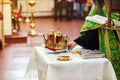 Newlyweds exchange wedding rings on a ceremony in the church