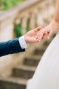 The newlyweds hold hands. Couple holding hands. Wedding in Monte Royalty Free Stock Photo