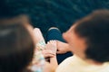 Newlyweds hold hands on the sea. Couple holding hands. Wedding i Royalty Free Stock Photo