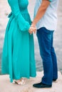 Newlyweds hold hands on the sea. Couple holding hands. Wedding i Royalty Free Stock Photo