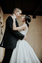 Newlyweds hug and look at each other. Bride and groom hugging Royalty Free Stock Photo