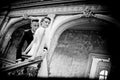 Newlyweds kissing near old stairs