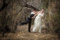 Newlyweds Playing in Forest Royalty Free Stock Photo