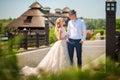 Newlyweds on a summer walk in the park. Wedding Ukrainian couple in Dnieper