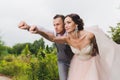 Newlyweds in a superman pose Royalty Free Stock Photo