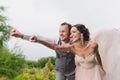 Newlyweds in a superman pose Royalty Free Stock Photo
