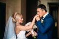 The newlyweds are walking in the park on the wedding day. The bride and groom Enjoying at the wedding day. Sunny weather. Royalty Free Stock Photo