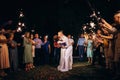 newlyweds at a wedding of sparklers Royalty Free Stock Photo