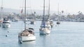 Newport beach harbor, weekend marina resort with yachts and sailboats, Pacific Coast, California, USA. Waterfront luxury suburb