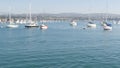 Newport beach harbor, weekend marina resort with yachts and sailboats, Pacific Coast, California, USA. Waterfront luxury suburb