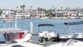 Newport beach harbor, weekend marina resort with yachts and sailboats, Pacific Coast, California, USA. Waterfront luxury suburb