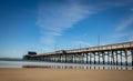 Newport beach pier in California, USA captured against the blue sky Royalty Free Stock Photo
