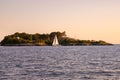 View of historic Castle Hill Inn seen from the water along the coast of Newport Rhode Island.