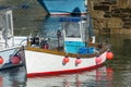 Newquay Harbour, Red and white fishing boat, moored after days fishing Royalty Free Stock Photo