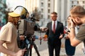 News before it is news. Cameraman recording interview. Journalism industry, live streaming concept. Royalty Free Stock Photo