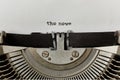 The news typed words on a vintage typewriter Royalty Free Stock Photo