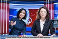 Newscasters share aliens practises Royalty Free Stock Photo