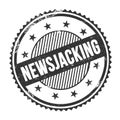 NEWSJACKING text written on black grungy round stamp