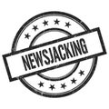 NEWSJACKING text written on black vintage round stamp