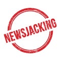 NEWSJACKING text written on red grungy round stamp