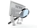Newspaper character looking through magnifying glass Royalty Free Stock Photo