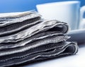 Newspaper and coffee cup.Blue background Royalty Free Stock Photo